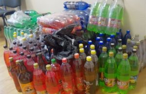 Garaže – ir cigaretės, ir alkoholis Garaže rastos neteisėtai laikomas akcizais apmokestintos prekės. Panevėžio policijos komisariato nuotr.