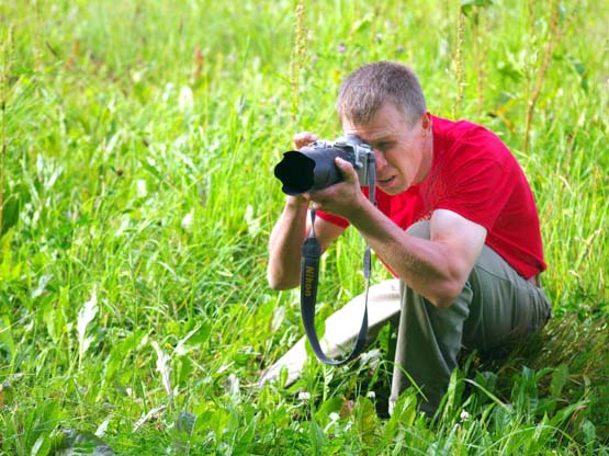 Metraštininkas V.Stumbrys ir pats pakliūna į kitų fotografų objektyvą. Vykinto Stumbrio nuotr.
